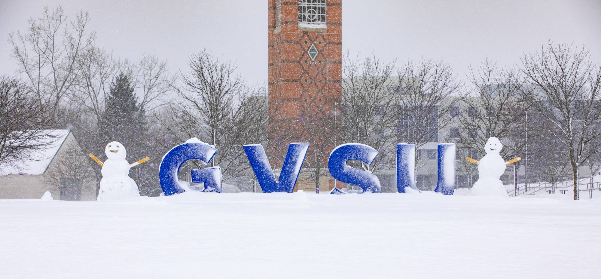 GVSU letter with snowmen next to them